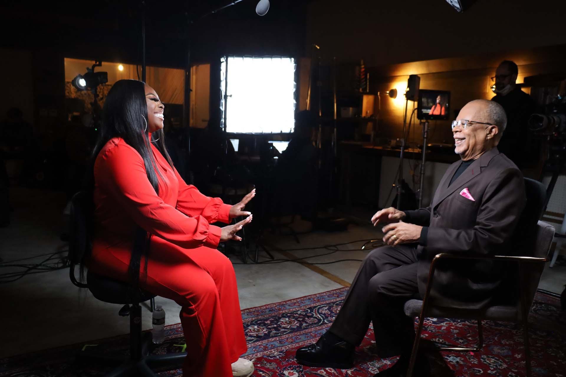 Host, Henry Louis Gates Jr. interviews Jekalyn Carr in a recording studio for GOSPEL