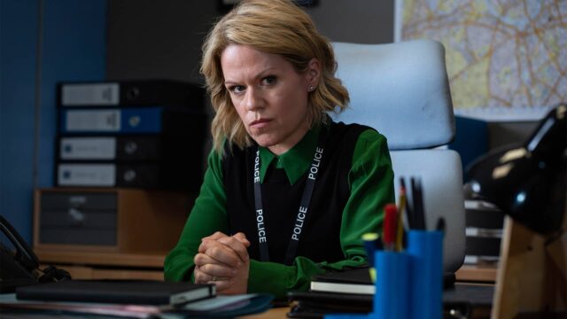 Unforgotten star Sinéad Keenan as DCI Jess James sitting at a desk